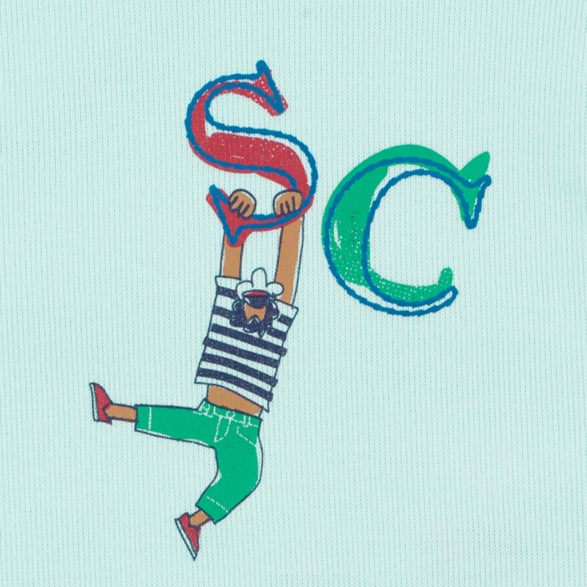 【公式】シナコバ (SINA COVA) クルーネックトレーナー 22120030 サックスの背面プリント